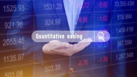 Quantitative easing written in search bar with the financial data visible o.. Stock Photos