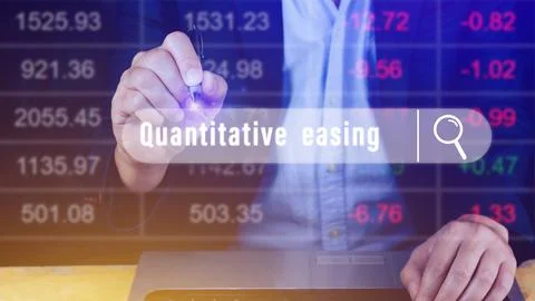 Quantitative easing written in search bar with the financial data visible o.. Stock Photos