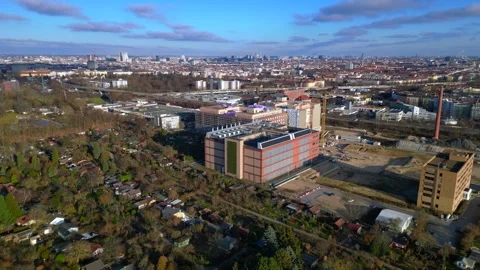 Quantum computer in datacenter building facility. Dramatic aerial view drone Stock Footage 325438872