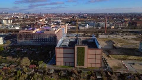 Quantum computer in datacenter building facility. Lovely aerial view drone Stock Footage 325438894