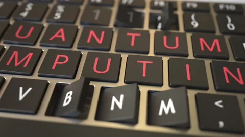 QUANTUM COMPUTING text being revealed with flipping keys of computer keyboard Stock Footage 170433648