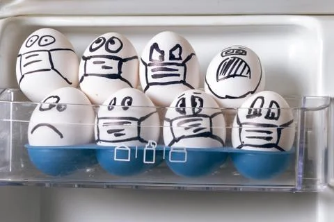 Quarantine easter concept. close up of diverse chicken easter eggs with doodle Stock Photos