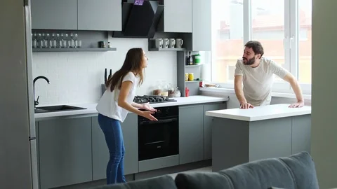 A quarrel of a couple in the kitchen Stock Footage 86401831