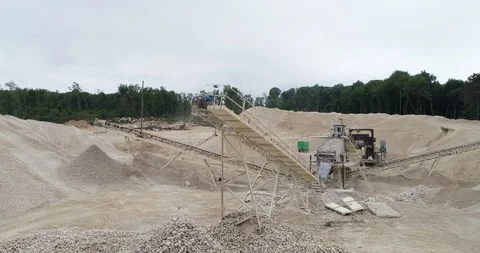 Quarry C Equipment Processing of Stone Falling from a Moving Conveyor Belt Stock Footage 122007597