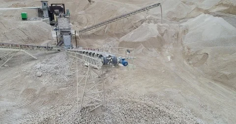 Quarry C Equipment Processing of Stone Falling from a Moving Conveyor Belt Stock Footage 122007766