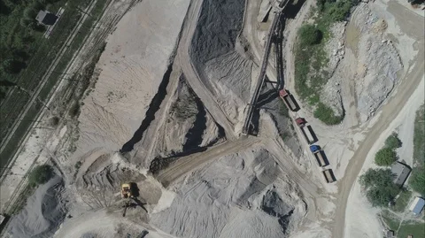 Quarry C Equipment Processing of Stone Falling from a Moving Conveyor Belt Drone Stock Footage 122008389