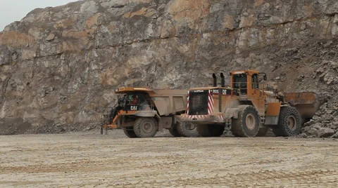 Quarry Digger Excavator loading Dumper Truck Version 2 Stock Footage 33608290