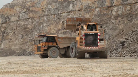 Quarry Digger Excavator loading Dumper Truck Version 3 Stock Footage 33618725