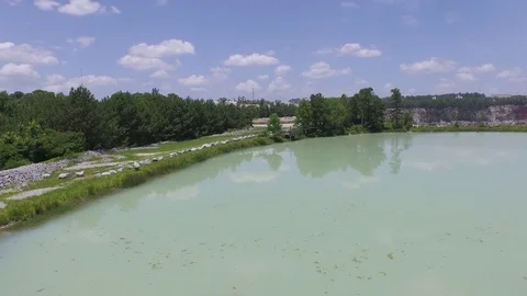 Quarry Lake green water blue sky peaceful still Stock Footage 85324853