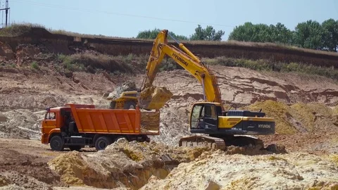 Quarry refractory clays, Clay quarry, Trucks, Mining,Excavators Stock Footage 82670477