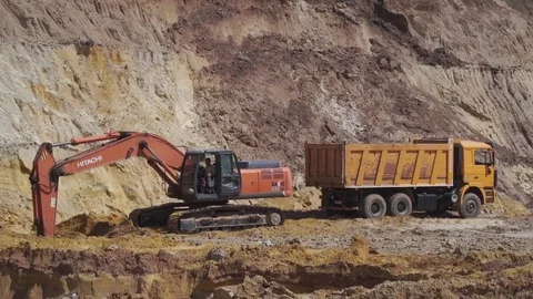 Quarry refractory clays, Clay quarry, Trucks, Mining,Excavators Stock Footage 82671271