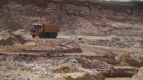 Quarry refractory clays, Clay quarry, Trucks, Mining,Excavators Stock Footage 82671391