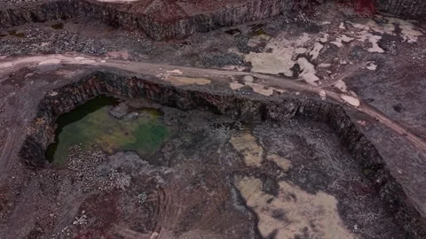 Quarry site with granite extraction and machinery operations Video stock 337935743