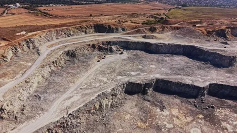 Quarry site with machinery during daylight hours Stock Footage 344539442