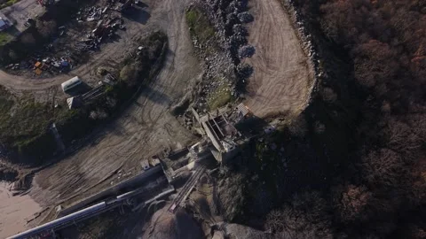 Quarry site overview showing mining operations and equipment in action Stock Footage 329997803