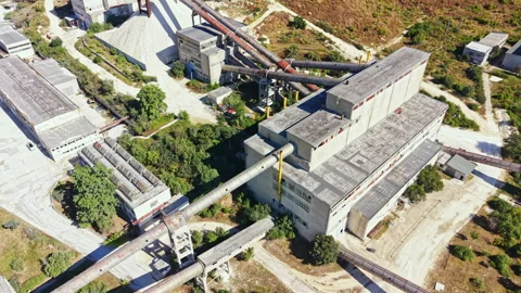 Quarry site with production facilities and transportation systems in operation Video stock 341077266