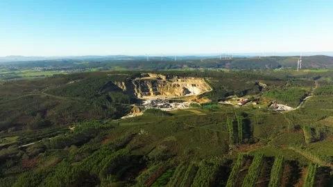 Quarry Site With Wind Turbines In The Background Generating Stock Footage 260338253