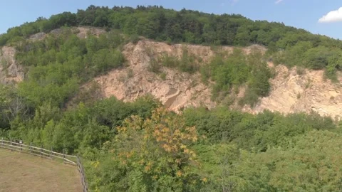 Quarry Stone Pit Strip Pit Rock Wall Crag Cliff Forest Drone Footage 4K Stock Footage 140269885