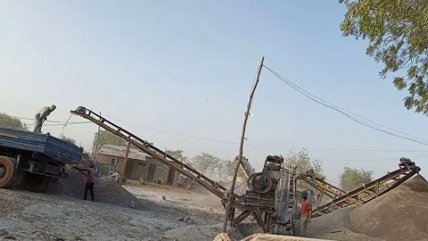 Quarry Workers Loading Crushed Granite Aggregates into Truck Stock Footage 321405234
