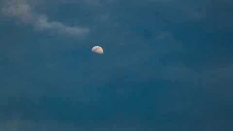Quarter Moon Rises Through Wispy Clouds Time Lapse Stock Footage 278630381