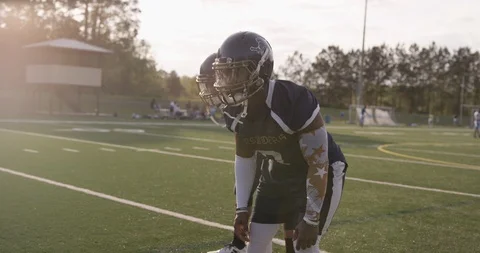 Quarterback throwing the ball in slow motion Stock Footage 107638552