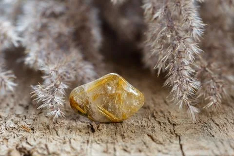 Quartz with rutile mineral stone close up Stock Photos