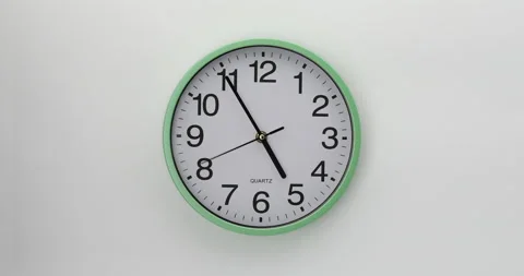 Quartz wall clock on a white background. One of the wall clock series. Video stock 141303447