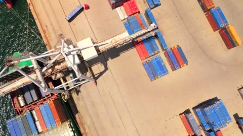 Quay Crane Loading Container Ship At Busy Port Terminal Aerial Stock Footage 339033079
