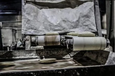 Quboos (Arabic Bread) making process Stock Photos