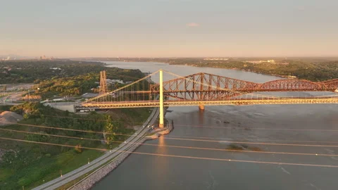Quebec and Pierre Laporte Bridges spanning the St. Lawrence River Stock Footage 342166768