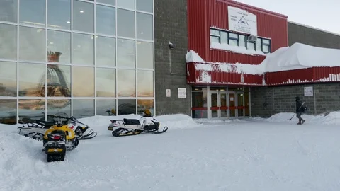 QUEBEC, CANADA: 01/12/2017: Chisasibi School, hockey player and snowmobiles Stock Footage 98748863