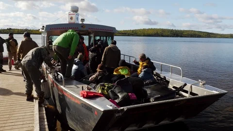 QUEBEC, CANADA: 08/14/2017: Cree Camp Louis-Jolliet, fishermen leaving on ferry Stock Footage 98748797