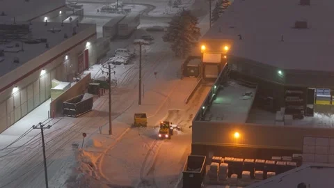 Québec, Canada Nov '25 - Midnight snow removal carving silent city streets Stock Footage 324863636