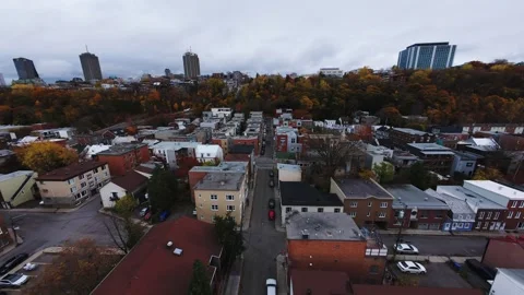 Quebec City skyline over St. Lawrence River, autumn clouds – 4K aerial Stock Footage 320033066