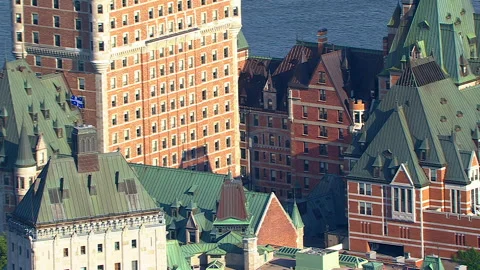Quebec Flag on Frontenac Hotel Castle, Helicopter Aerial View Video stock 258450118
