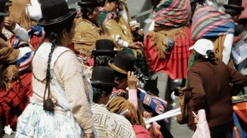 Quechua indigenous walking to a ceremony Stock Footage 86085271