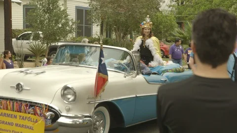 Queen on car in parade Stock Footage 104888182