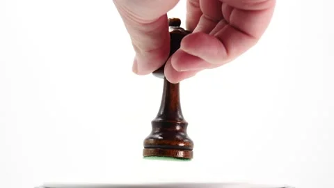 Queen chest piece knocking over King in slow motion isolated on white checkmate Vidéo 218412045