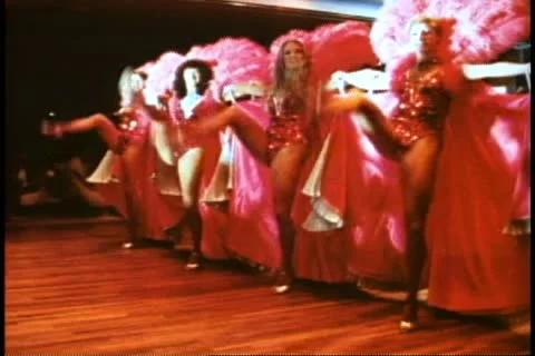 QUEEN ELIZABETH 2, 1982, QE2 showroom, World Cruise, showgirls, feather boas Video stock 11154560