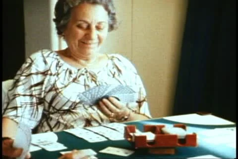 QUEEN ELIZABETH 2, 1982, QE2, World Cruise, card playing, older foursome Video stock 11159522