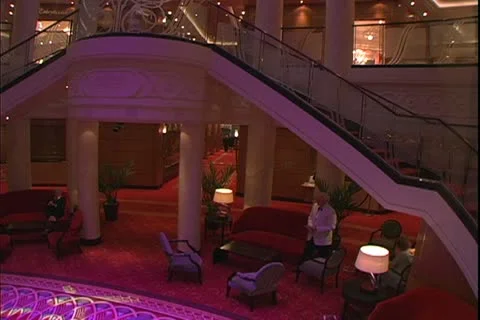 QUEEN MARY 2, 2004, Ocean liner, interior glass elevator at night Stock Footage 19759387