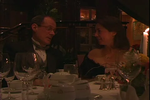 QUEEN MARY 2, 2004, Ocean liner, Britannia Restaurant, couple in formal dress Stock Footage 19816403