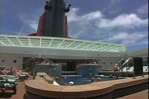 QUEEN MARY 2, 2004, Ocean liner, swimming pool under smoke stack on the QM2 Stock Footage 20448783