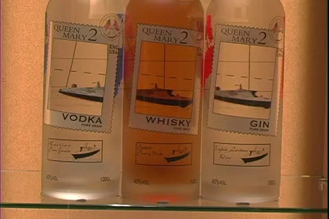 QUEEN MARY 2, 2004, Ocean liner, liquor bottles in shops, vodka, whiskey and gin Stock Footage 20463640