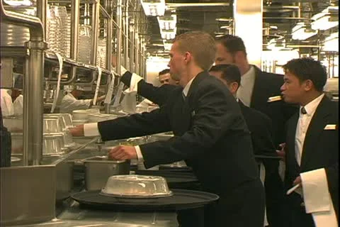 QUEEN MARY 2, 2004, Ocean liner, galley, kitchen, dining stewards pickup meals Video stock 20463974