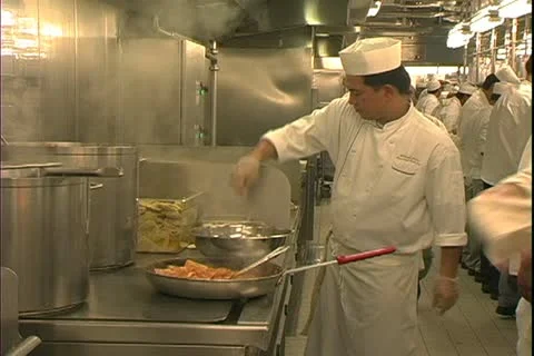 QUEEN MARY 2, 2004, Ocean liner, galley, kitchen, chefs with skillets and ladles Stock Footage 20465191