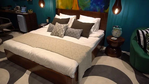 The Queen Size Bed Inside The Bedroom With The Pillows Stock Footage 105883062