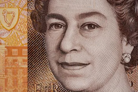 Queen's portrait on currency note in close view at an indoor setting Stock Illustration