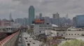 Queens View New York City Skyline Elevated Tracks Subway Train Departing Passing HD Footage