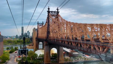 Queensboro Bridge structure viewed from Roosevelt Island Tramway. Industrial Stock Footage 330265403